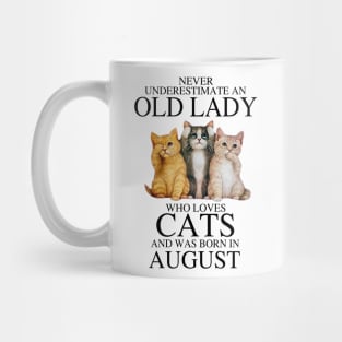 Never Underestimate An Old Lady Who Loves Cats August Mug